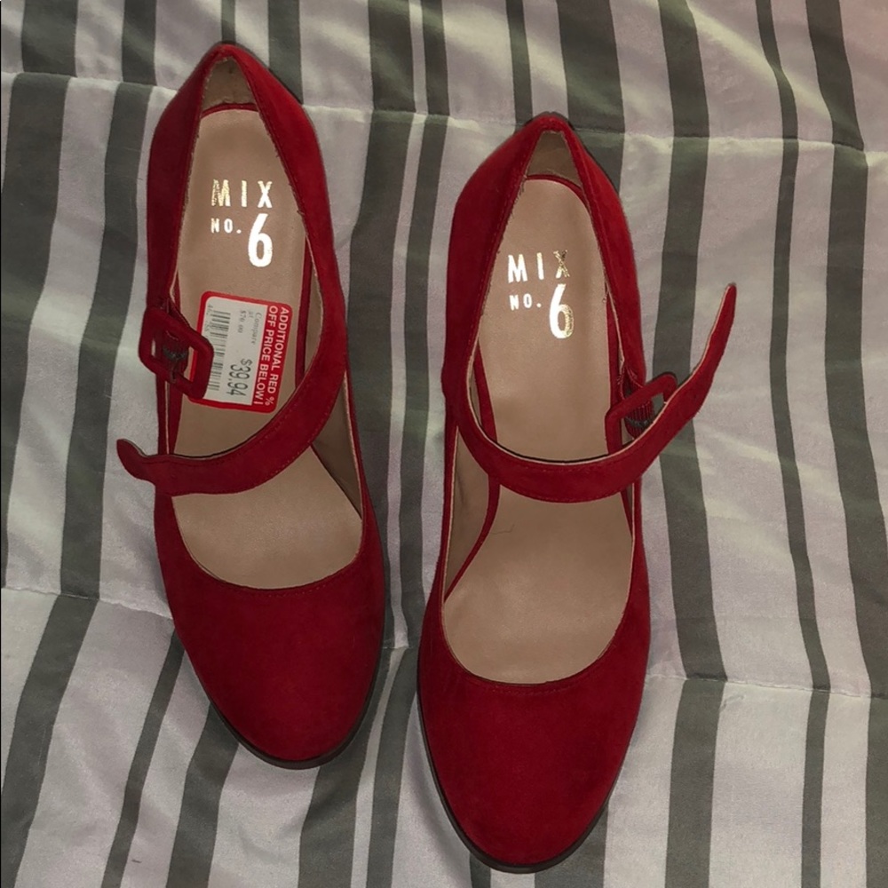 Never worn Red Heels
